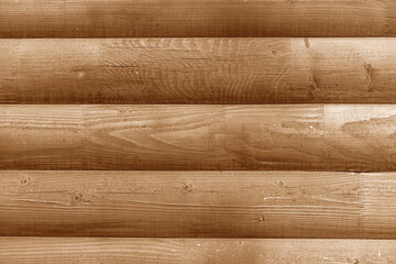 Texture of a wooden blockhouse made of logs. - obrazy, fototapety, plakaty