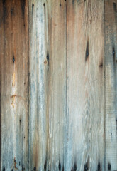 Fototapeta na wymiar A wall of old rotten wooden planks. Natural raw planed texture . flat lay. Copy space.