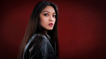 Fototapeta premium Young Asian woman in profile - studio photography