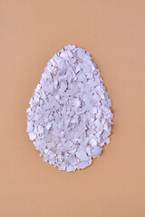 Big egg made of eggshell shards.
