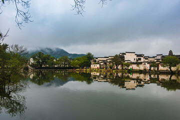 reflection of town in the lake