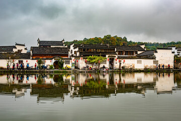 reflection of town in the lake