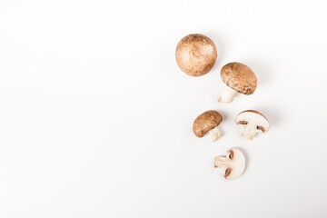 champignons mushrooms isolated on the white background. top view