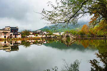 reflection of town in the lake