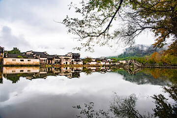 reflection of town in the lake