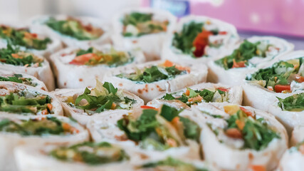 Catering banquet table with snack canape in restaurant or hotel