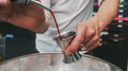 Mixed punch with fresh fruits in metal bowl