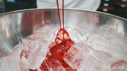 Mixed punch with fresh fruits in metal bowl