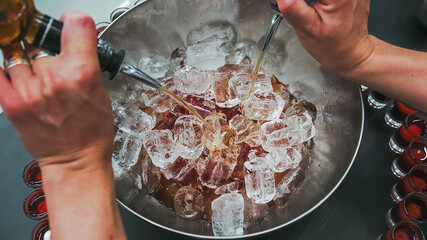 Mixed punch with fresh fruits in metal bowl