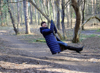 portrait of a woman on a swing 