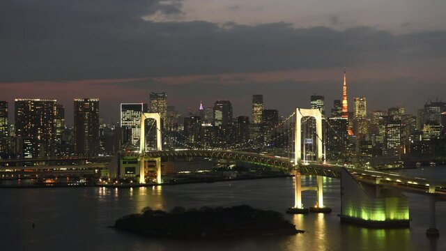 Tokyo Japan Feb 12, 2019 Time-lapse: Aerial view of Rainbow bridge at dusk Tokyo , Japan