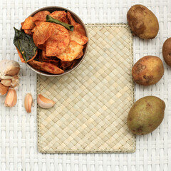 Indonesian Spicy Potato Chips (Keripik Kentang Balado)with Copy Space for Text. Top View, Selected Focus
