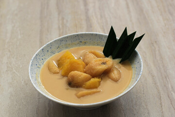 Kolak Pisang Ubi is Banana Sweet Potato Compote. Popular Indonesian Dessert Made from Coconut milk, Palm Sugar and Pandanus Leaves. Very popular during Ramadhan