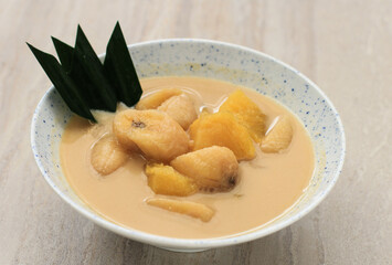 Kolak Pisang Ubi or Banana and Sweet Potato Compote is Popular Indonesian Dessert made from Banana Sweet Potato Cooked with Coconut Milk, Palm Sugar, and Pandan Leaves. Popular during Ramadan