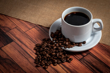 cup of coffee with beans