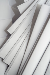 Obraz premium folded paper signatures - bookbinding theme