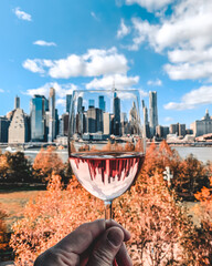 new york city skyline mirroring in wine glass 