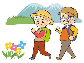ハイキングをするシニア夫婦