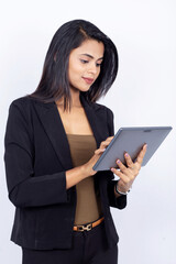 Indian businesswoman on white background - working on a touchscreen gadget