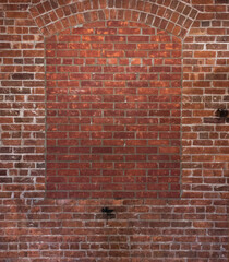 Brick wall with a bricked window