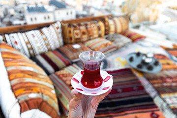 Turkish Tea and colorful turkish rugs