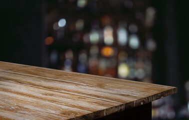 Empty wooden table in front of abstract blurred background of coffee shop . can be used for display or montage your products.Mock up for display of product