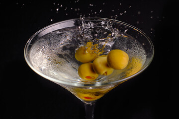 martini olive splash drink delicious alcohol beverage 