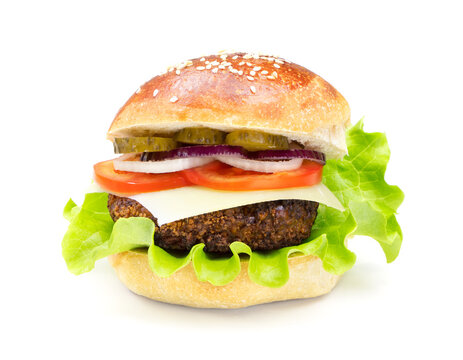 Cheeseburger isolated on a white background. Hamburger with cheese. Burger isolated. Copy space. Tasty dinner