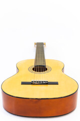 Close up acoustic guitar isolated on white background