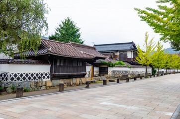 Fototapeta na wymiar Tonomachi district is the street block of the former samurai district is particularly nicely preserved with earthen walls, historic buildings and a water canal filled with carps.