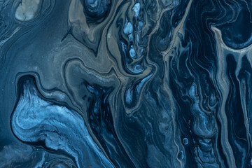 Obraz premium Abstract fluid art background navy blue colors. Acrylic painting on canvas with sapphire gradient and splash.