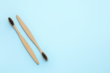 Tooth brushes on color background