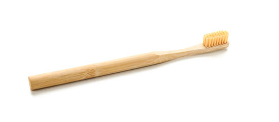 Wooden tooth brush on white background