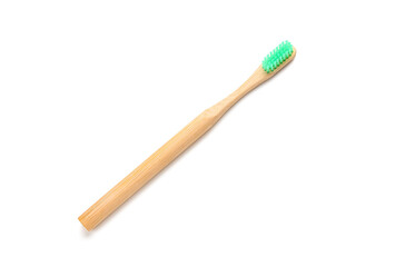 Wooden tooth brush on white background