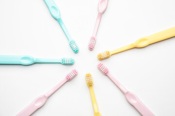 Tooth brushes on white background
