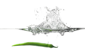 Falling of fresh chili pepper into water against white background