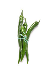Green chili peppers on white background