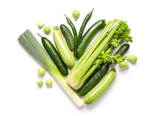 Fresh green vegetables on white background