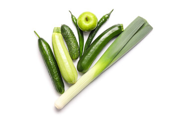 Fresh green vegetables on white background