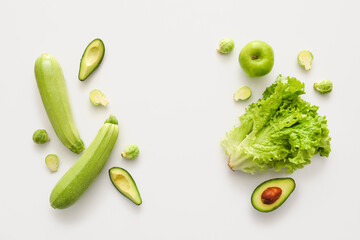 Fresh green vegetables on white background