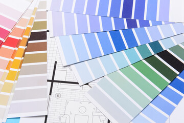 Paint color samples on drawing of house