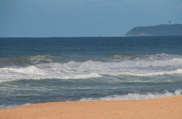 Beach and Sea at Durban with Bluff in Background