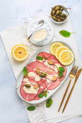 Vitello tonnato - Italian cuisine, sliced veal with tuna sauce as antipasto