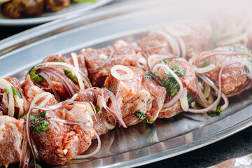 marinated meat for barbecue. Meat skewered and ready to grill