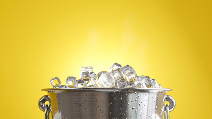 3d render of ice cube on stainless bucket © KWstudio