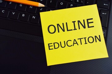 Online Education text andwriting on a colorful sticker note. Concept meaning eLearning Electronic...