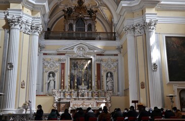 Fototapeta na wymiar Napoli - Lezione agli extracomunitari nella Basilica di San Severo Fuori le Mura