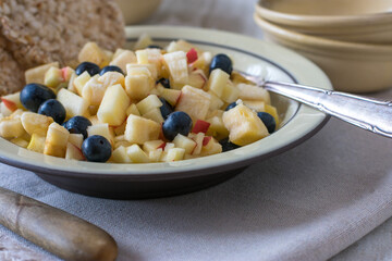 Energy food - healthy natural snack with chopped fruits and brown rice cakes