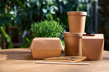 Cardboard containers for food, drinks, items. Copy space. Delivery, takeaway, zero waste, eco production packaging concept