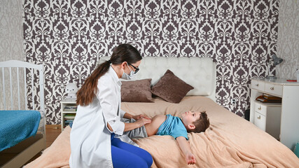 The child has a stomach ache, the doctor checks